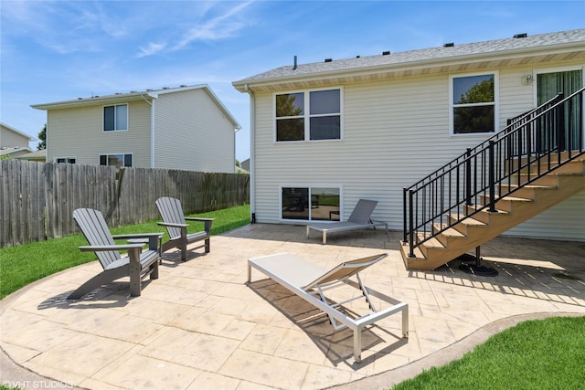 200 Walnut Dr NW, Bondurant, IA 50035 - view of patio featuring stairs