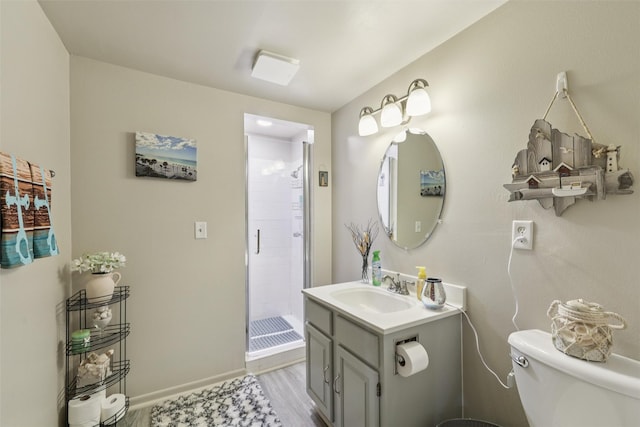 4200 SW 23rd Pl, Des Moines, IA 50321 - bathroom featuring vanity, a stall shower, and wood finished floors