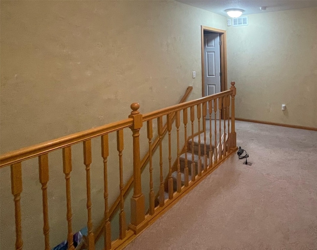 2101 Meadow Ct Unit 304, Des Moines, IA 50320 - stairway featuring carpet flooring