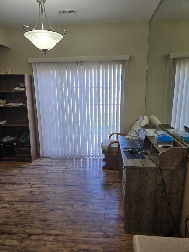 2101 Meadow Ct Unit 304, Des Moines, IA 50320 - dining room with dark wood-type flooring