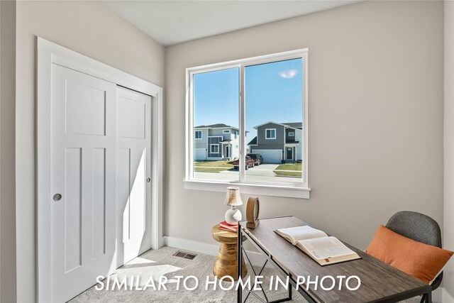 1488 S 91st St, West Des Moines, IA 50266 - carpeted home office featuring baseboards