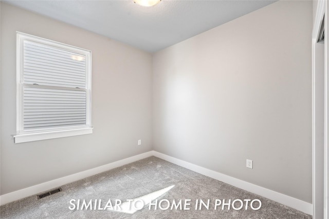 1488 S 91st St, West Des Moines, IA 50266 - empty room featuring carpet and baseboards