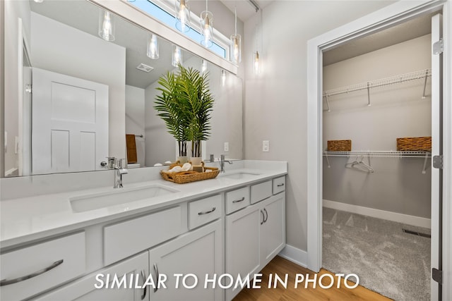 1488 S 91st St, West Des Moines, IA 50266 - full bathroom with double vanity and a spacious closet