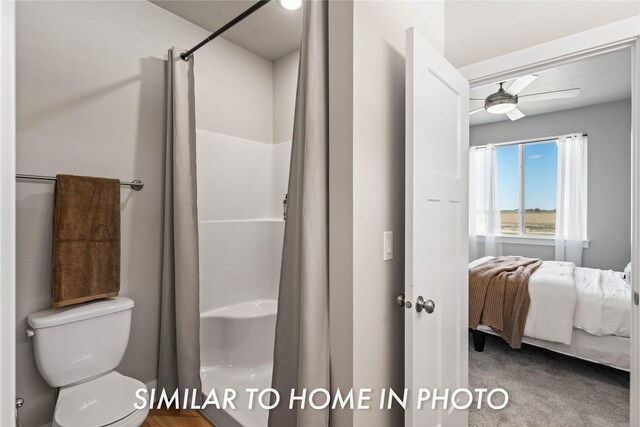 1488 S 91st St, West Des Moines, IA 50266 - bathroom featuring ensuite bathroom, a ceiling fan, and a shower with shower curtain