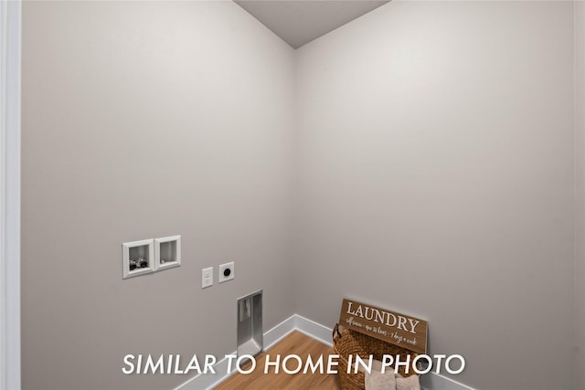 1488 S 91st St, West Des Moines, IA 50266 - washroom featuring hookup for a washing machine, hookup for an electric dryer, and wood finished floors