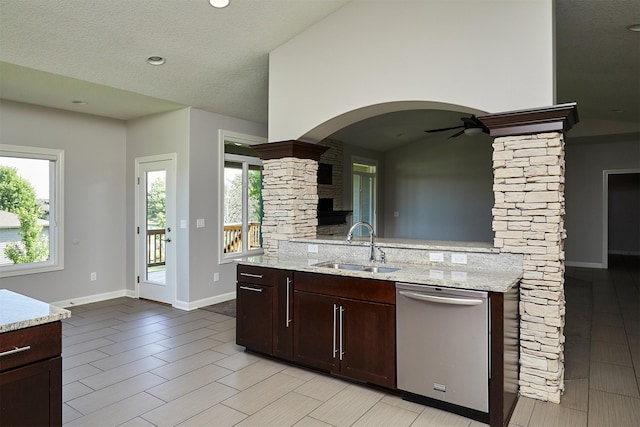 9305 Sugar Creek Cir, West Des Moines, IA 50266 - kitchen featuring dishwasher, a ceiling fan, light stone countertops, plenty of natural light, and recessed lighting