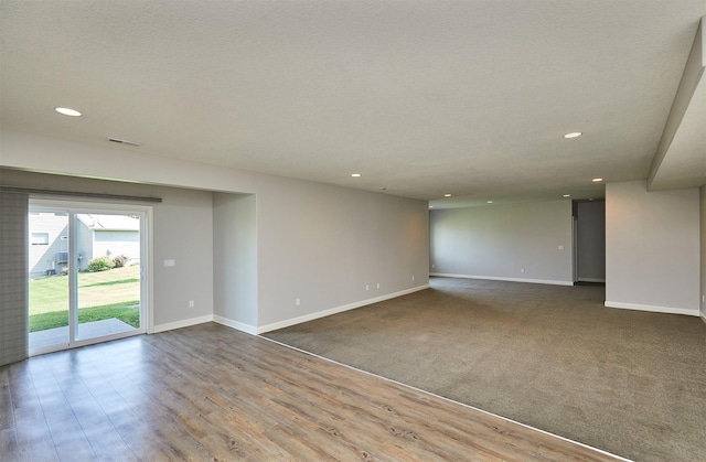 9305 Sugar Creek Cir, West Des Moines, IA 50266 - unfurnished room featuring recessed lighting and wood finished floors
