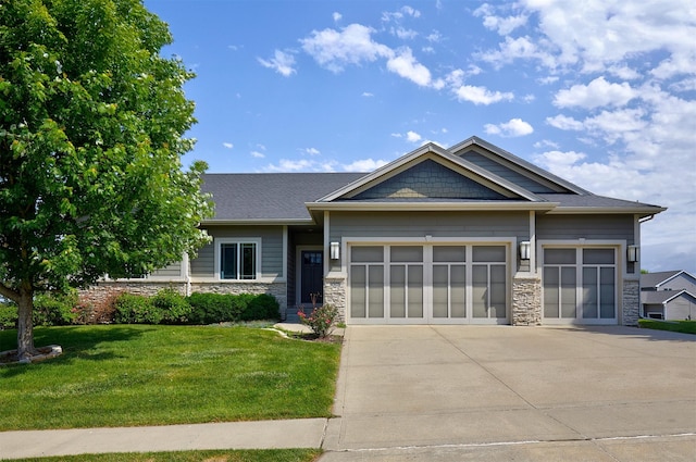 9305 Sugar Creek Cir, West Des Moines, IA 50266 - craftsman-style home featuring stone siding, an attached garage, a front yard, and concrete driveway