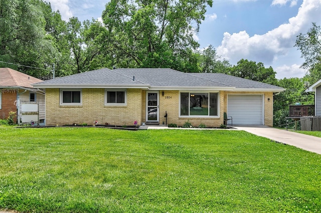 2904 Shadyoak Dr, Des Moines, IA 50310 - ranch-style home featuring brick siding, a garage, driveway, a front lawn, and entry steps