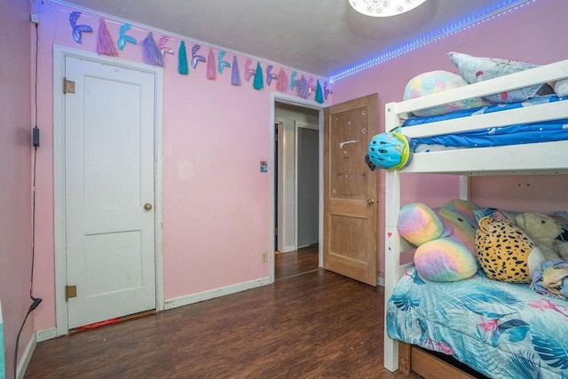 310 E 19th St S, Newton, IA 50208 - bedroom with wood finished floors and baseboards