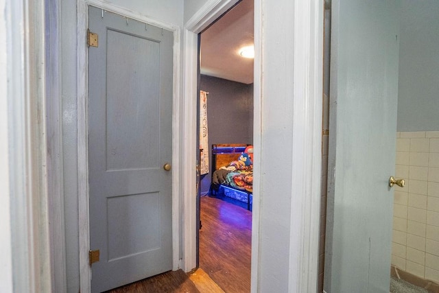 310 E 19th St S, Newton, IA 50208 - corridor featuring wood finished floors