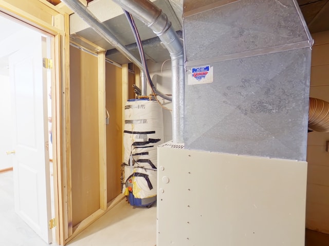 4425 Amick Ave, Des Moines, IA 50310 - utility room with heating unit and water heater