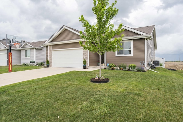 1165 Locust St, Waukee, IA 50263 - view of front facade featuring an attached garage, concrete driveway, and a front yard