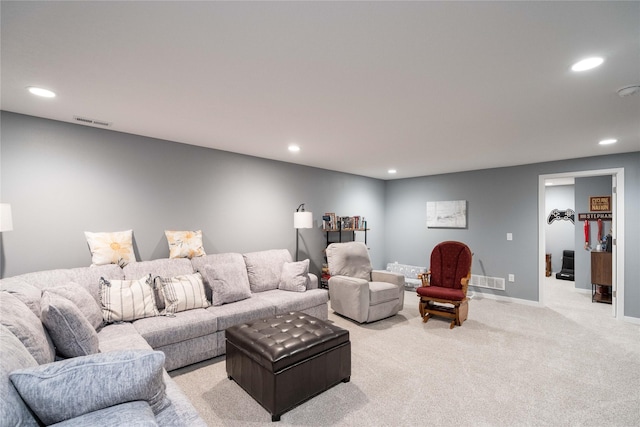 1165 Locust St, Waukee, IA 50263 - living room featuring recessed lighting and light carpet