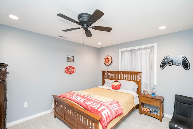 1165 Locust St, Waukee, IA 50263 - bedroom with light colored carpet, recessed lighting, and a ceiling fan