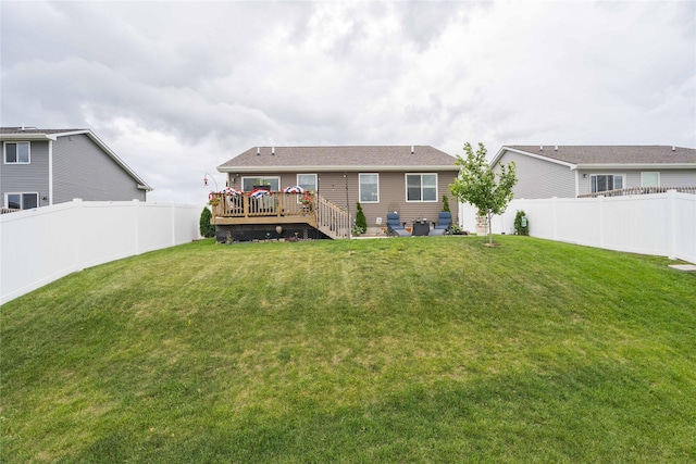 1165 Locust St, Waukee, IA 50263 - rear view of property with a fenced backyard and a wooden deck