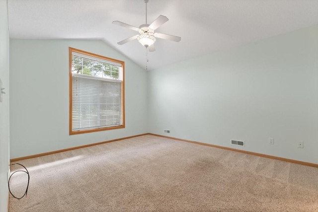 130 NW Georgetown Blvd Unit 4, Ankeny, IA 50023 - unfurnished room featuring carpet, vaulted ceiling, and a ceiling fan