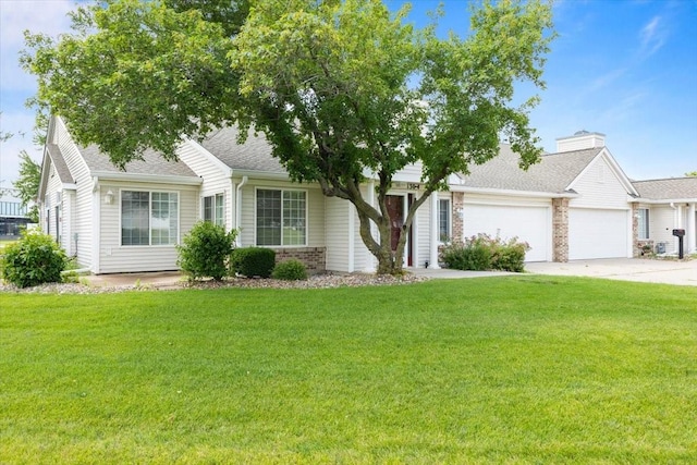 130 NW Georgetown Blvd Unit 4, Ankeny, IA 50023 - view of front of home with a garage, concrete driveway, a front lawn, and brick siding