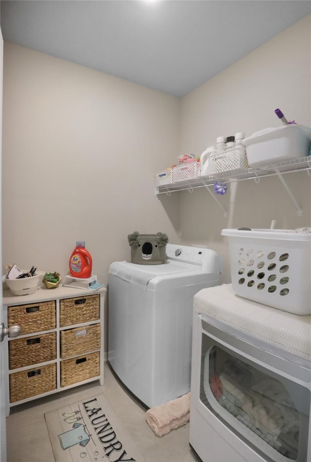 70 Prairie Bluff Dr, Waukee, IA 50263 - washroom featuring washer and clothes dryer