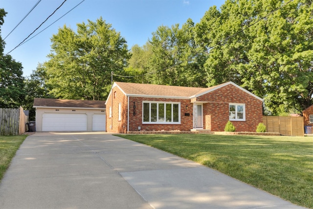 1808 Payton Ave, Des Moines, IA 50315 - ranch-style house featuring brick siding and a detached garage