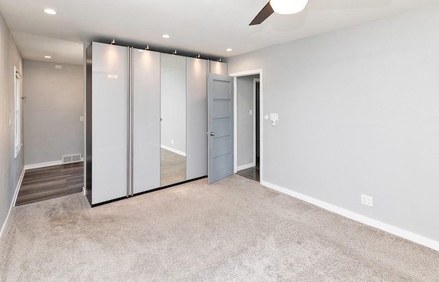 1808 Payton Ave, Des Moines, IA 50315 - unfurnished bedroom with carpet flooring, recessed lighting, and ceiling fan