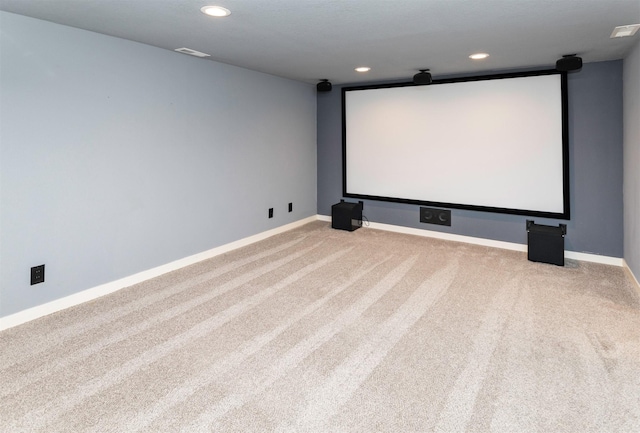 1808 Payton Ave, Des Moines, IA 50315 - home theater room featuring carpet flooring and recessed lighting