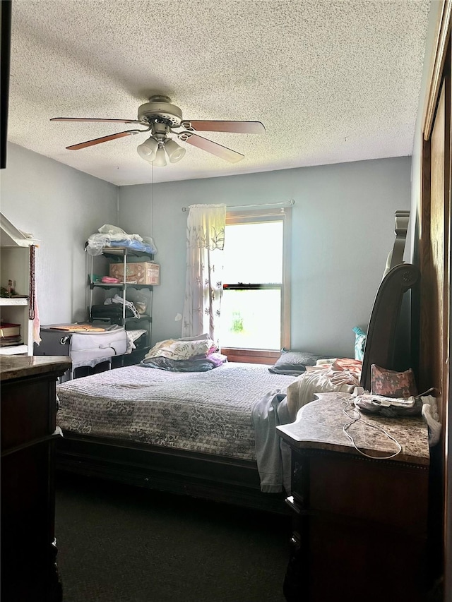 3521 SE 20th St, Des Moines, IA 50320 - bedroom with a textured ceiling and a ceiling fan