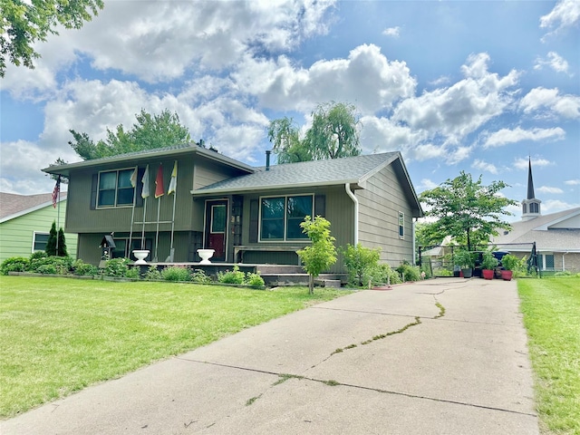 3521 SE 20th St, Des Moines, IA 50320 - split level home with a front yard and concrete driveway