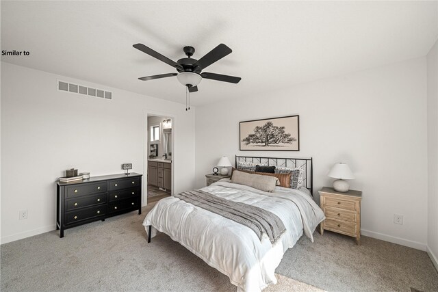 1620 NW Jackson Dr, Ankeny, IA 50023 - bedroom featuring light colored carpet, ceiling fan, and connected bathroom