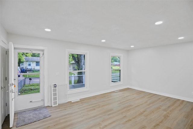 2420 E 37th St, Des Moines, IA 50317 - entryway featuring light wood-type flooring and recessed lighting