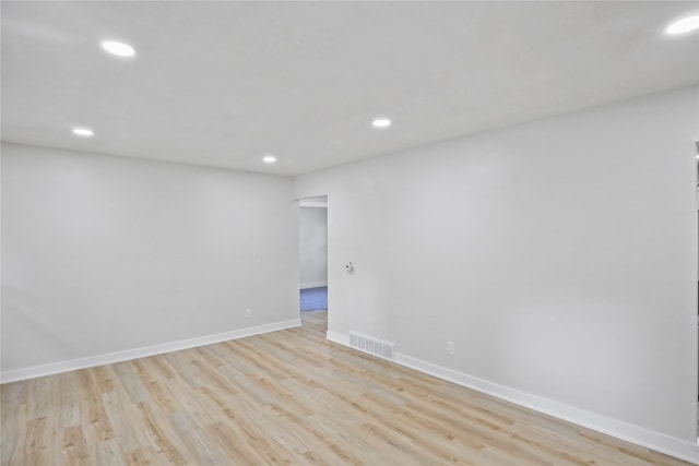2420 E 37th St, Des Moines, IA 50317 - unfurnished room with recessed lighting and light wood finished floors