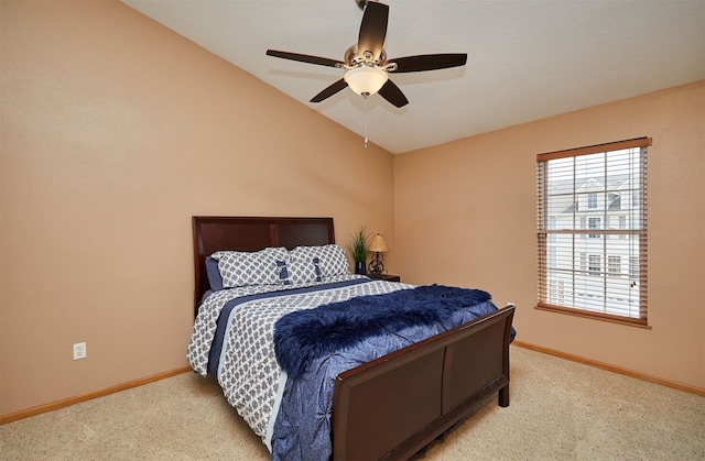 8302 Westown Pkwy Unit 3102, West Des Moines, IA 50266 - carpeted bedroom with vaulted ceiling and ceiling fan