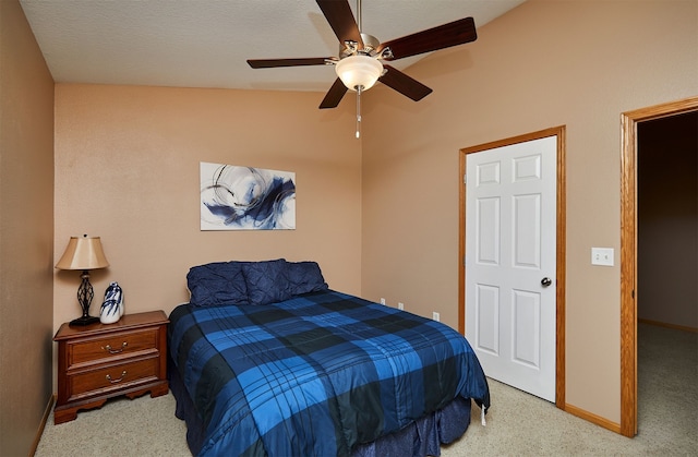 8302 Westown Pkwy Unit 3102, West Des Moines, IA 50266 - carpeted bedroom with vaulted ceiling and a ceiling fan