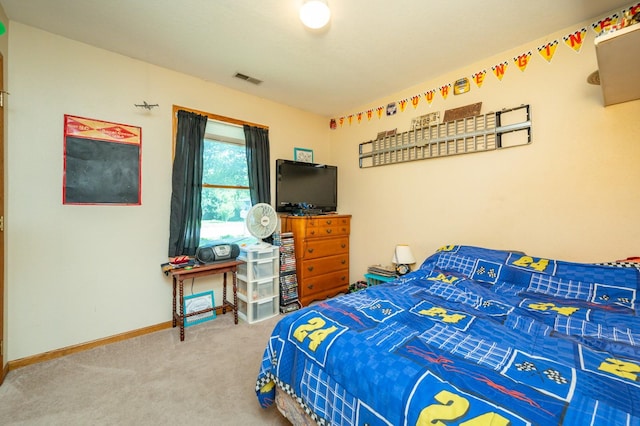 605 Grand St, New Virginia, IA 50210 - bedroom featuring carpet flooring and baseboards