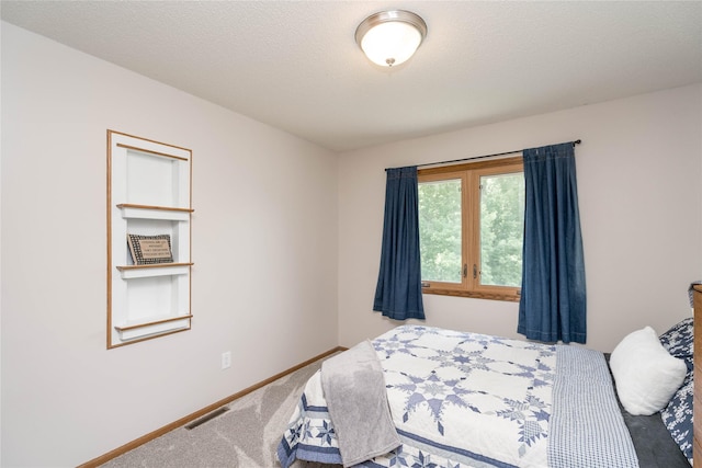 130 SW Meadowlark Ct, Ankeny, IA 50023 - carpeted bedroom featuring baseboards