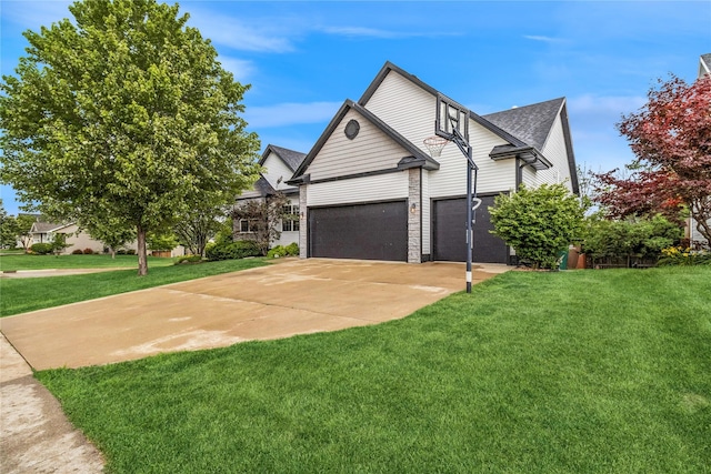 1701 2nd Ave SW, Altoona, IA 50009 - view of front of home with concrete driveway, a front lawn, roof with shingles, and an attached garage