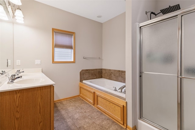 1701 2nd Ave SW, Altoona, IA 50009 - bathroom with a bath, a shower stall, double vanity, a chandelier, and tile patterned flooring