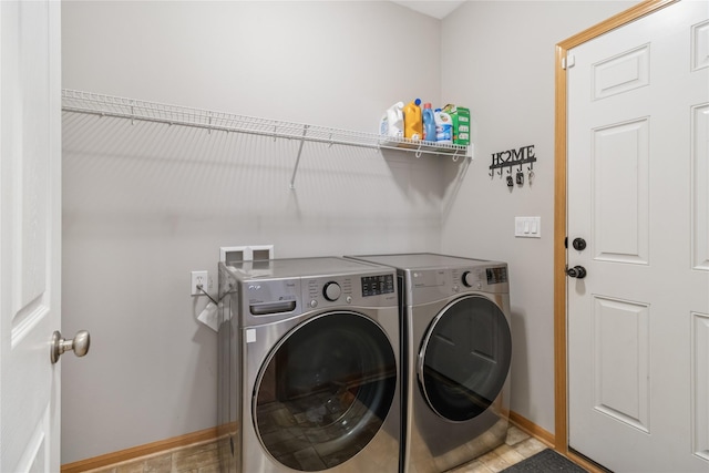 1701 2nd Ave SW, Altoona, IA 50009 - laundry area with independent washer and dryer and baseboards