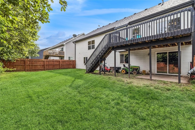 1701 2nd Ave SW, Altoona, IA 50009 - back of house featuring stairway, a wooden deck, and a patio