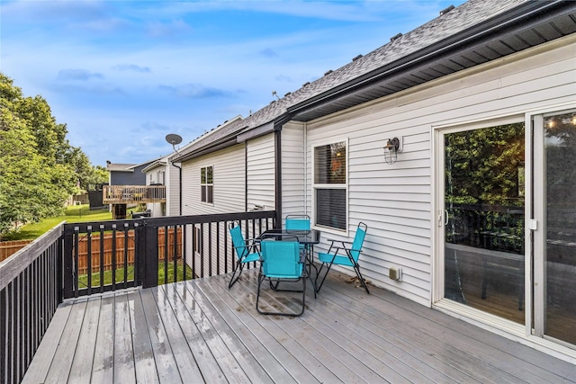 1701 2nd Ave SW, Altoona, IA 50009 - wooden deck with outdoor dining space