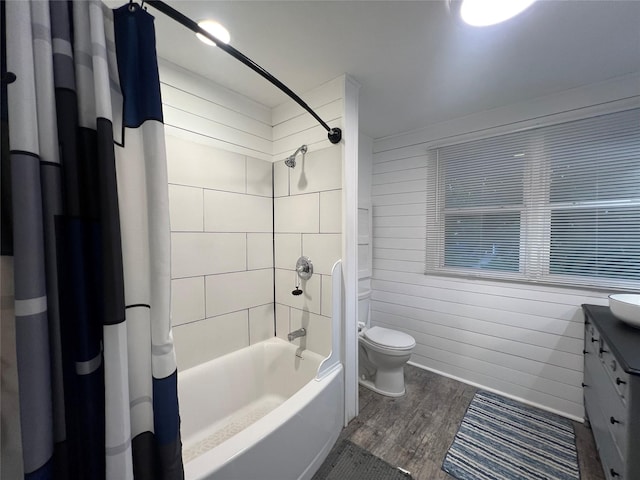 109 E Jackson St, Panora, IA 50216 - full bath featuring shower / bathtub combination with curtain, wood finished floors, vanity, and wood walls