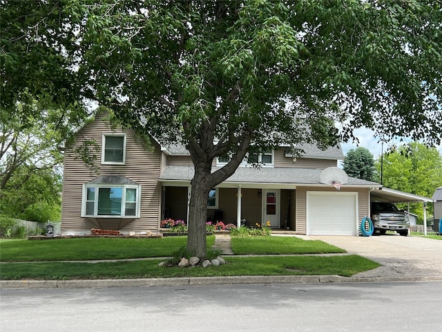 109 E Jackson St, Panora, IA 50216 - view of front of property featuring concrete driveway, a front yard, an attached garage, a carport, and a shingled roof