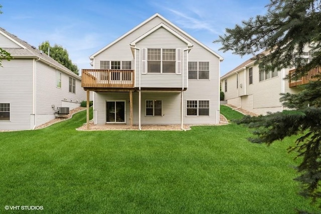 8318 Boulder Dr, West Des Moines, IA 50266 - back of property with a lawn and a wooden deck