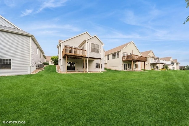 8318 Boulder Dr, West Des Moines, IA 50266 - back of property with a yard and a wooden deck