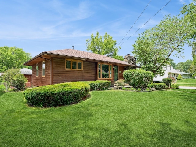 2400 Farwell Rd, Des Moines, IA 50317 - view of front of property featuring a chimney and a front lawn