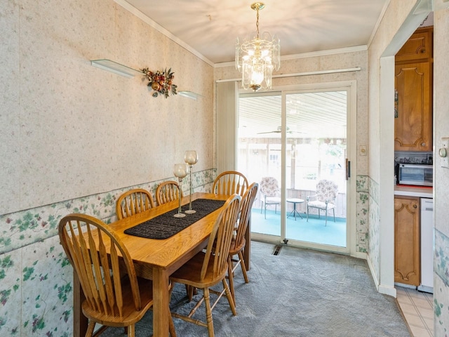 2400 Farwell Rd, Des Moines, IA 50317 - dining area with a chandelier, wallpapered walls, and light colored carpet