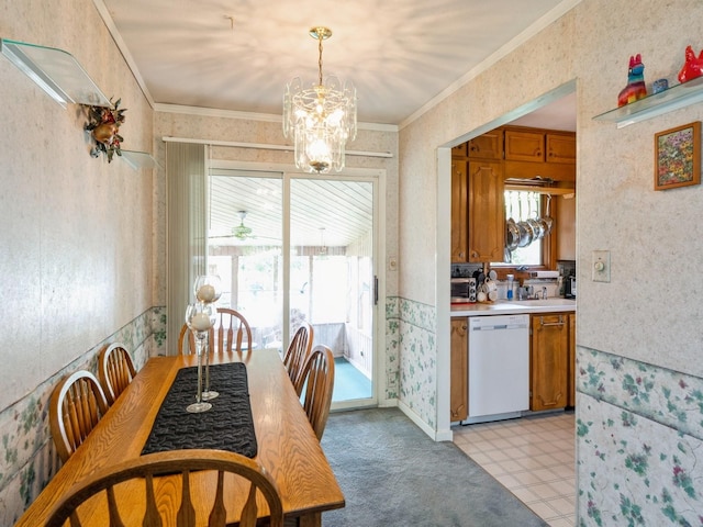 2400 Farwell Rd, Des Moines, IA 50317 - dining room with a chandelier, ornamental molding, and wallpapered walls