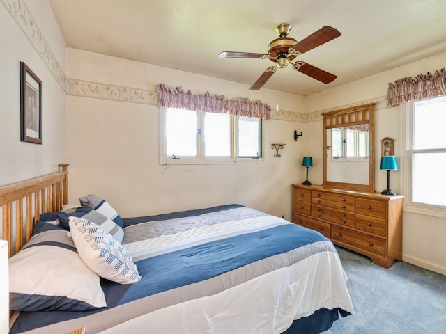 2400 Farwell Rd, Des Moines, IA 50317 - carpeted bedroom featuring a ceiling fan