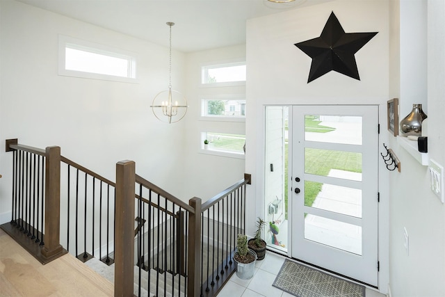 309 NW Beechwood Dr, Grimes, IA 50111 - foyer entrance with a chandelier