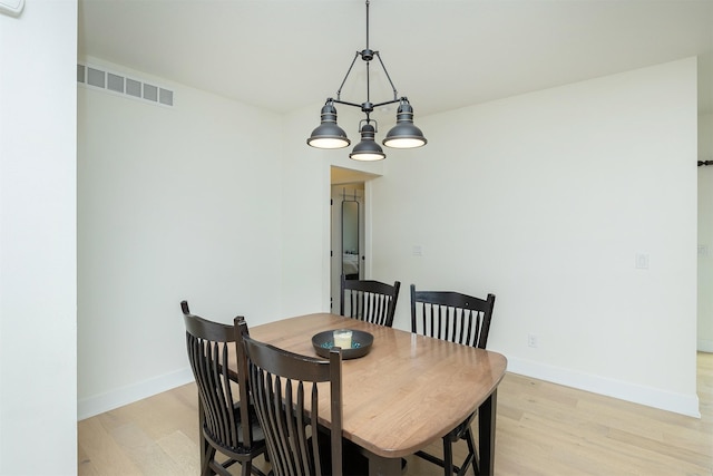 309 NW Beechwood Dr, Grimes, IA 50111 - dining space featuring light wood-style floors and baseboards